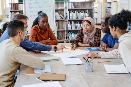 Group of diverse people sitting with each other